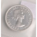 One Dollar "Elisabeth II." (Kanada, 1958), Silber, Totempfeil, Dm. ca. 3,6 cm, Gewicht ca.23,45 g.