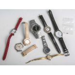 Konvolut von 8 Damen- u. Herrenarmbanduhren, bestehend aus: Omega, Junghans Mega, Seiko 5u.a., teils