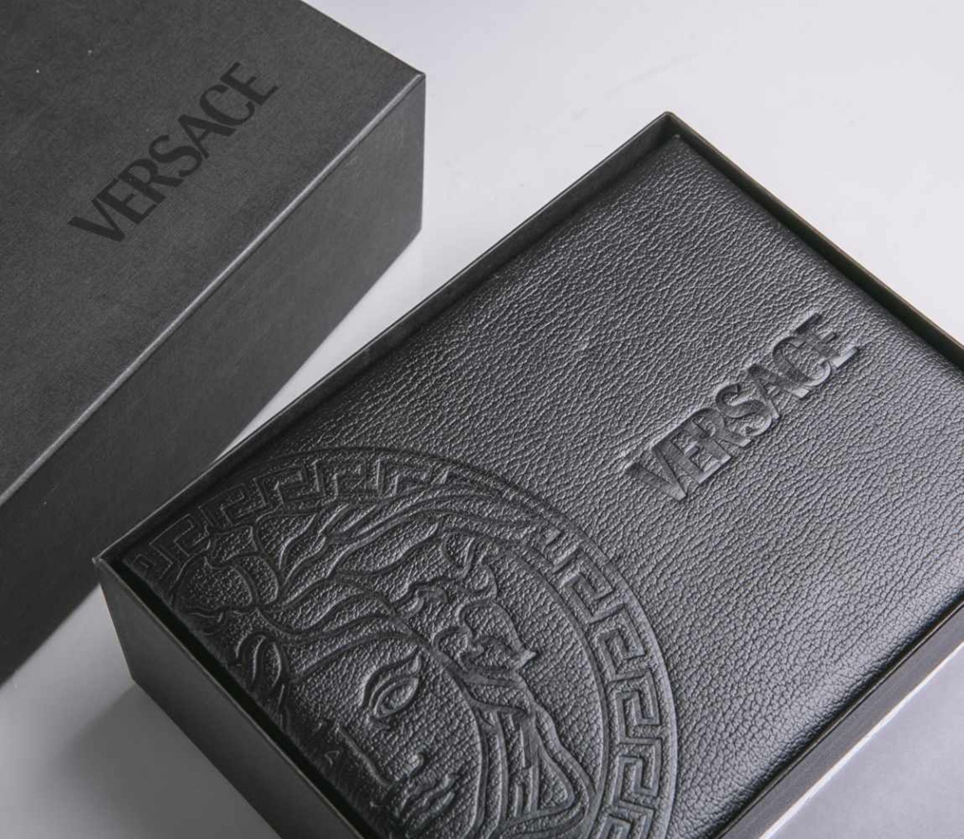 Original Uhrenbox von Versace (neuzeitlich), überzogen mit schwarzem Kunstleder, ca. 8 x20 x 15