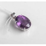 Anhänger 750 WG, besetzt m. einem oval faccetierten Amethyst, ca. 18,13 mm, Gewicht ca. 6g.- - -21.