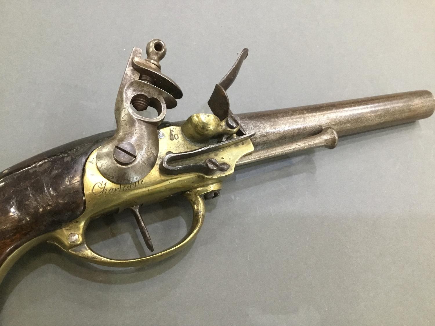 An early 19th Century French Flinlock pistol engraved 'Charleville' stamped 'F80' - Image 2 of 4