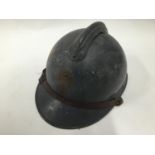 A WWII Polish Military helmet(badge missing), blue finish.