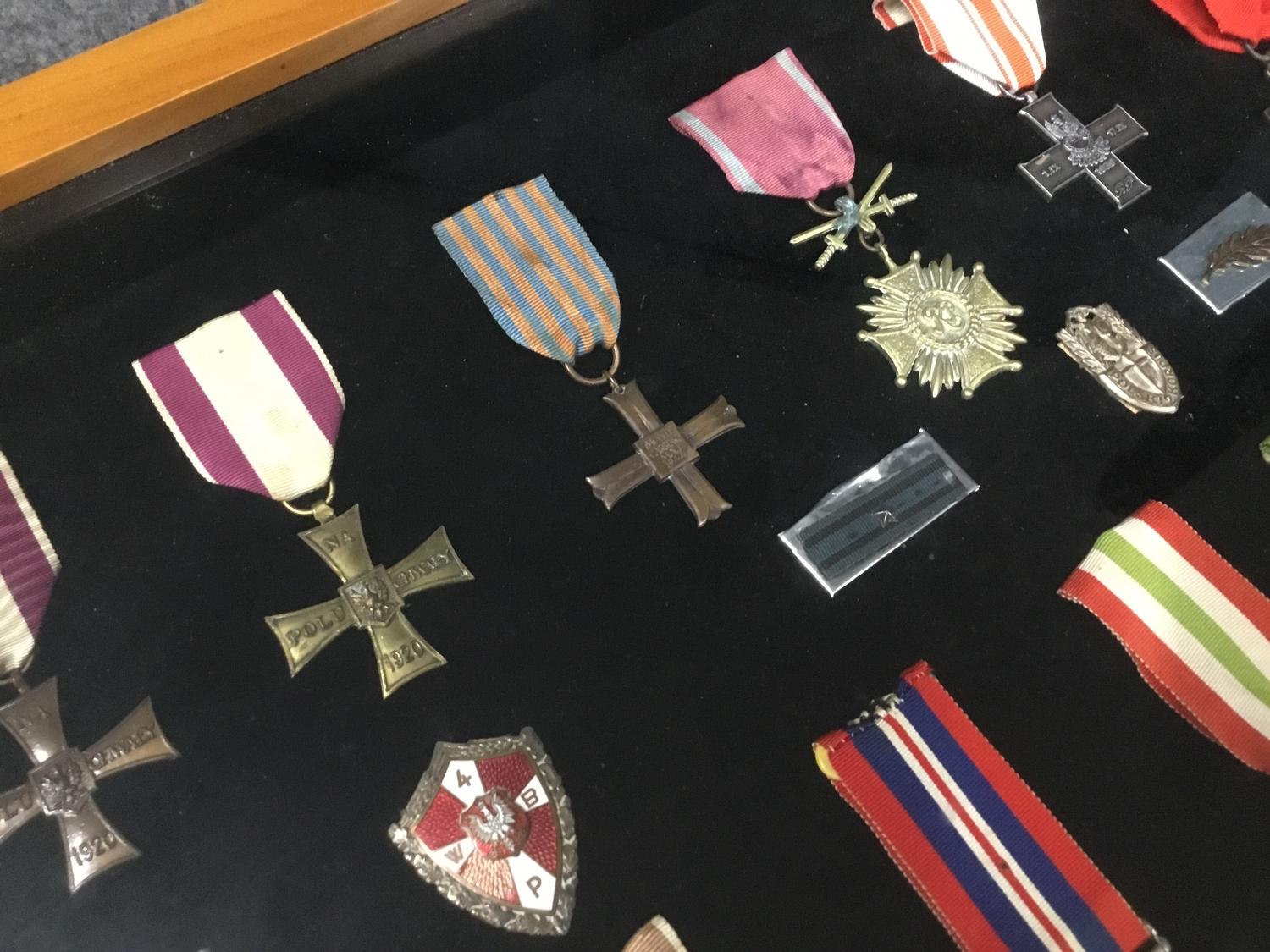 A framed collection of Polish and British WWII medals. - Image 4 of 4