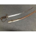 A William IV Cavalry sword, stamped 'W14' over crown, with steel scabbard and walnut grip