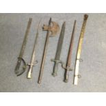 Five various 19th Century metal scabbards and an unmounted sword blade