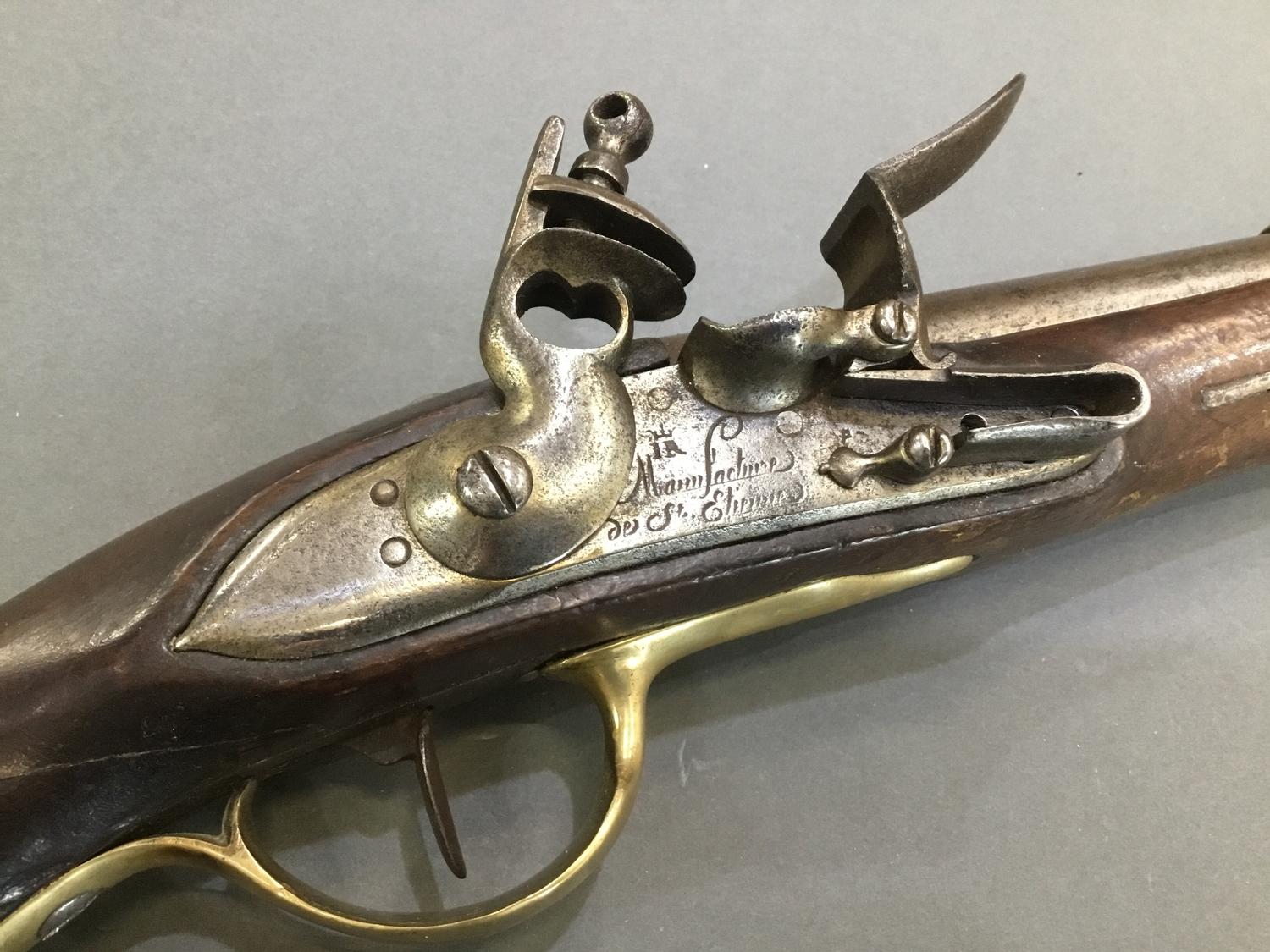 A late 18th Century French flintlock pistol engraved 'Manufacture do St Etienne' - Image 2 of 5