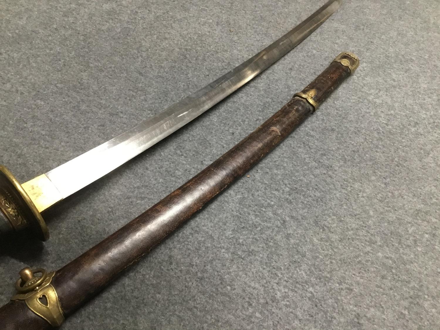 A Japanese 'Samuri' sword with bronze and copper inlaid tsuba, fish skin grip. - Image 4 of 11