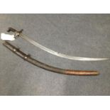 A Pesian Shamshir with leather scabbard, horn mounts with steel grip.