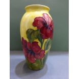 Moorcroft vase with Hibiscus flowers, on a yellow ground