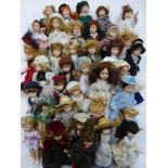 Collection of 36 vintage 4" porcelain dolls