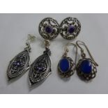 3 pairs of silver earrings ( 2 pairs with purple stones, other pair blue stones)