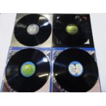 Four Beatles LPs