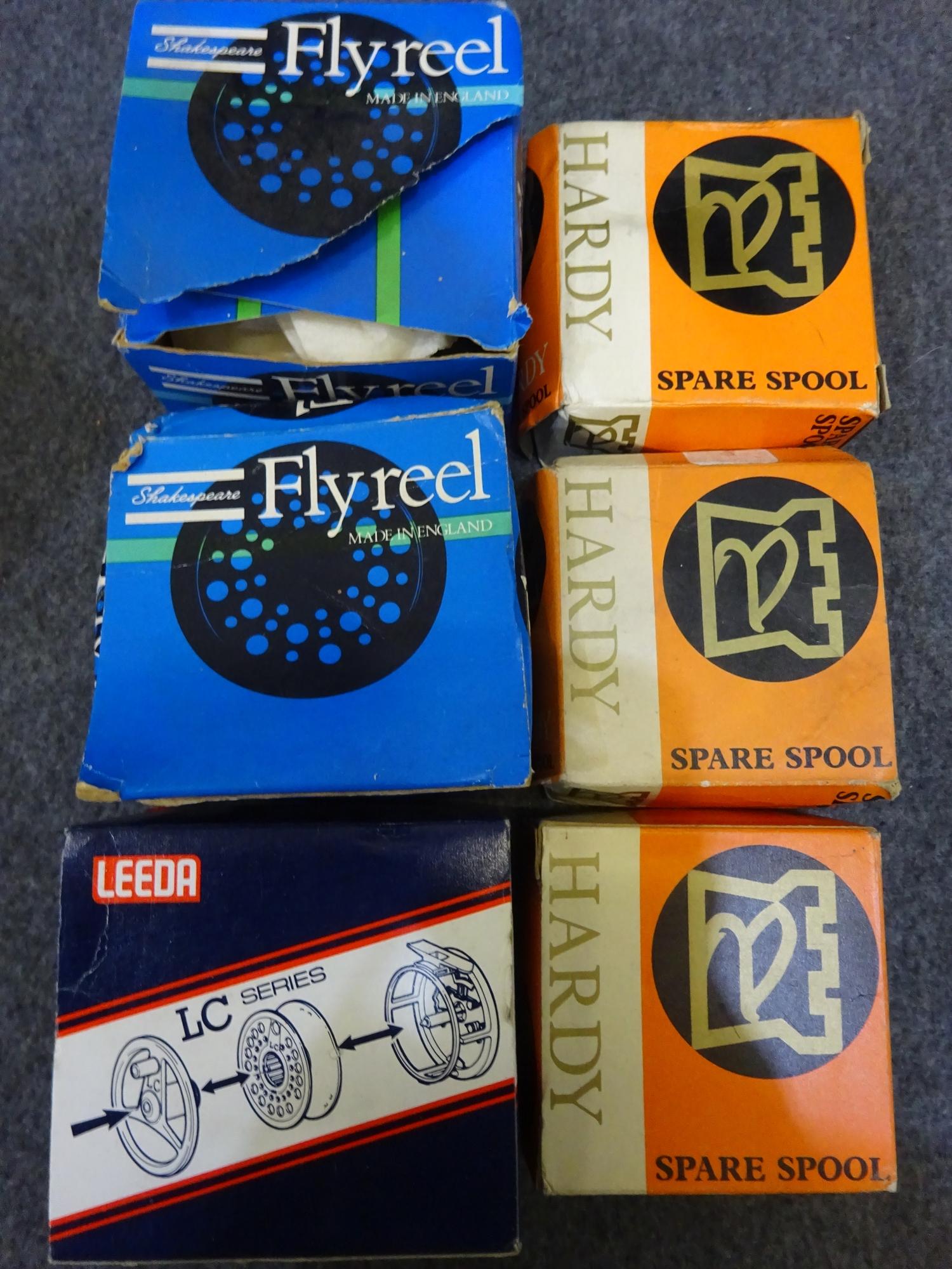 Three boxed fly fishing reels & two spare spools (6)