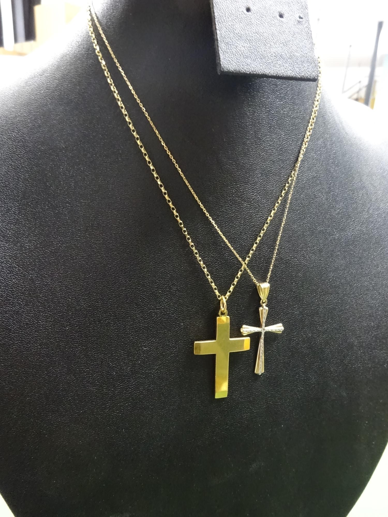 9ct gold crucifix on circle ink chain, white metal detail, and two further examples, weight 10g (4)