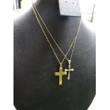 9ct gold crucifix on circle ink chain, white metal detail, and two further examples, weight 10g (4)