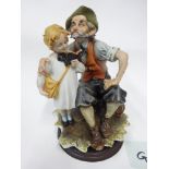 Capodimonte - Boy reading to man