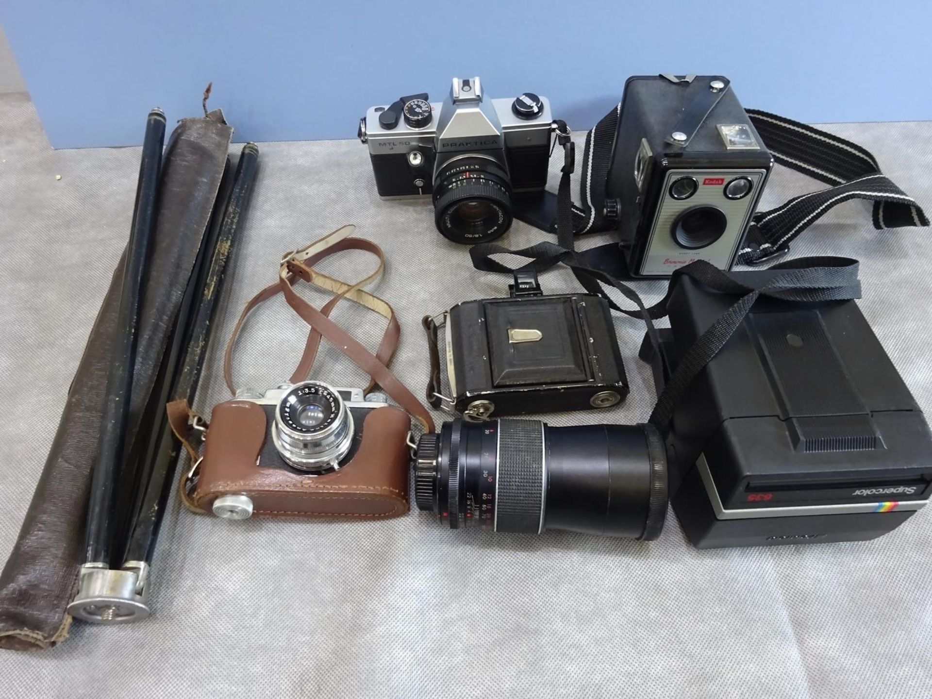 Collection of vintage cameras and accessories