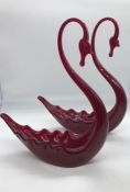 A Pair of Whitefriars ruby glass swans.