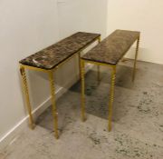 A Pair of Adam Williams design gold leaf frame Narwhal console tables on twisted brass legs with