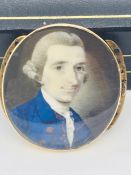 JOHN STORDY (IRISH, 1730-1799) A Gentleman in a blue coat signed middle right Stordy 1772. Miniature
