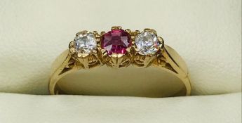 A 9ct yellow gold three stone ring