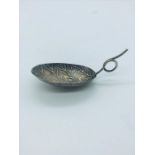 A Silver Caddy spoon of leaf design, hallmarked Birmingham 1874.