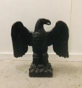 A large Bronze eagle with spread wings approx. 70cm tall by 70cm wide.