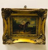 A gilt framed oil on board of soldier and his horse by Cusachs 30cm x 25cm