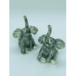 A pair of unusual condiments in the form of elephants stamped 800