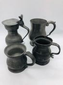 Four old English pewter tankards all with various touch marks or stamps.