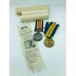 Great War Medal and Victory Medal for 29124 PTE C Greeenwood Manch Reg.along with a remembrance silk