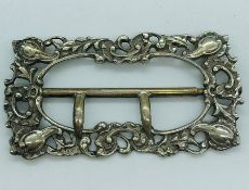 A White metal buckle