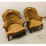 Pair of deconstructed wing back chairs in need of re-upholstery.