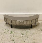 Decorated silver fire hearth cover in an art deco style