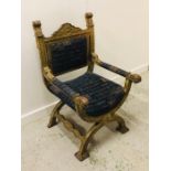 A Savonorola Italian 19th Century gilt wood with leaf decoration and blue chenille upholstery with