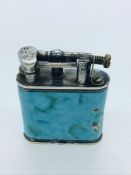 A Vintage silver lighter by Dunhill, hallmarked and with W&G makers mark.