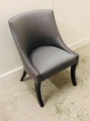 A Contemporary grey upholstered chair