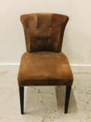 Brown Suede contemporary occasional chair with button back and brass stud trim