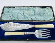 A Boxed set of George V silver plated fish servers with silver collars 1913