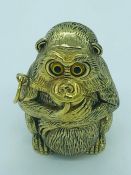 A vesta case in the form of a monkey