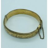 A 9ct yellow gold bracelet with safety chain (16.4g)