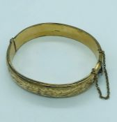 A 9ct yellow gold bracelet with safety chain (16.4g)