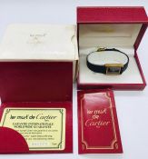 A boxed Le Must de Cartier watch in box with original card.