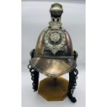 A White Metal presentation fire helmet from 1892 with reference to Windsor Fire Brigade