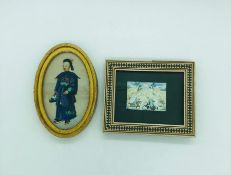 Two Oriental framed images.
