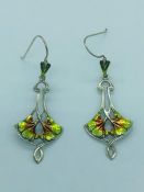 A pair of silver and enamel art nouveau style drop earrings