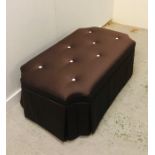 A Chocolate brown upholstered ottoman with cream buttons and hinged lid. 126cm x 72cm