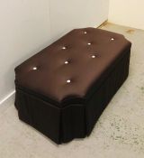 A Chocolate brown upholstered ottoman with cream buttons and hinged lid. 126cm x 72cm