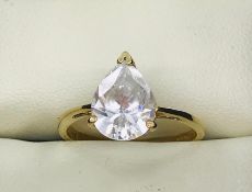 9ct, yellow gold ring with central pear shaped CZ stone.