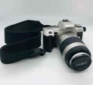 A Minolta Maxxum TSi film camera minotla 1.1m/3.6ft macro lens in original bag